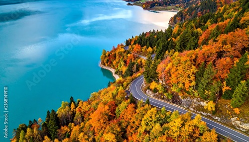 Aerial View of Lake Tahoe California Surrounded by Mountain Landscape and Tropical Island Style Blue Waters Scenic Nature Background