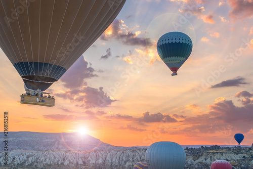 Fotografie Hot air balloons flying above Cappadocia at sunrise