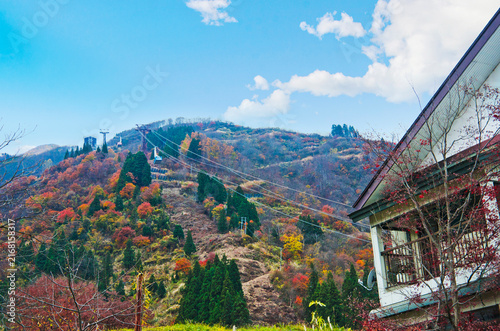 Bild auf Leinwand Panoramic view of a mountain ranges at Yuzawa town in Autumn, Niigata prefecture, Japan