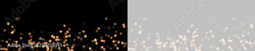 Fotografie Scattered orange and yellow bokeh lights on black background forming a horizonta