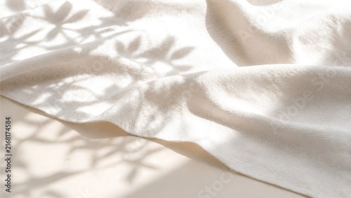 Soft White Linen Fabric With Natural Botanical Shadows and Warm Sunlight