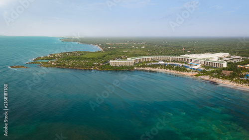Aerial view of an amazing caribbean beach and luxury resort in Playa del Carmen, Cancun, Mexico.