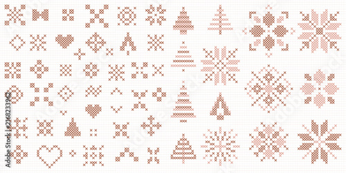 Scandinavian cross stitch Christmas vector set with neutral geometric snowflakes, hearts, and pine trees, modern winter embroidery motifs illustration for holiday stationery and crafts