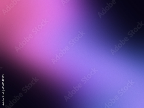 Soft gradient of purple and pink light blending with dark background