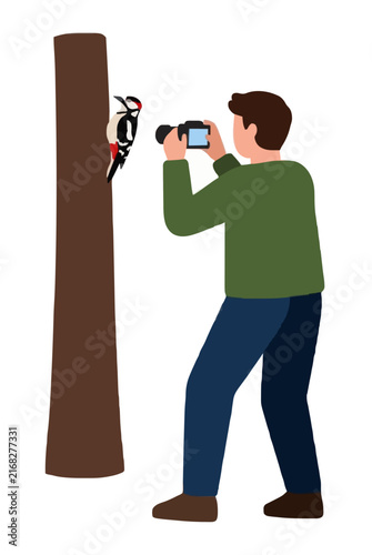 Hand-drawn vector illustration of a young man in a green sweater photographing a colorful woodpecker clinging to a tree trunk with a camera, wildlife observation concept art