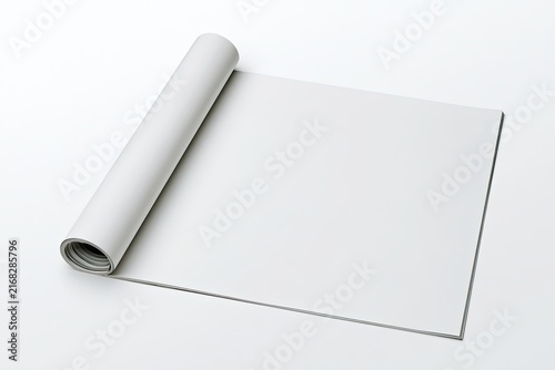 Open, blank magazine spread with one rolled page
