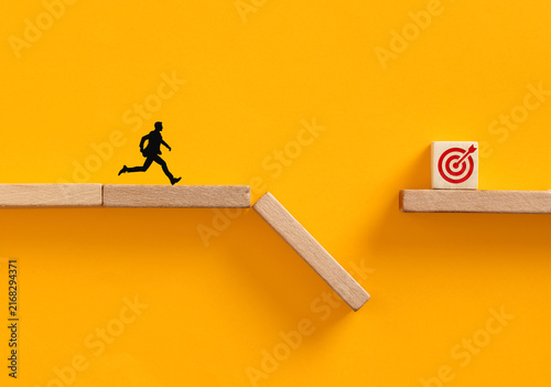 Quadro su tela Person running towards target over obstacle gap