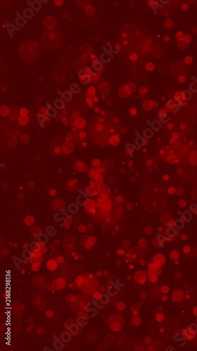 Red Bokeh Flicker Loop. Red particles on red background seamless loop animation, vertical resolution.
