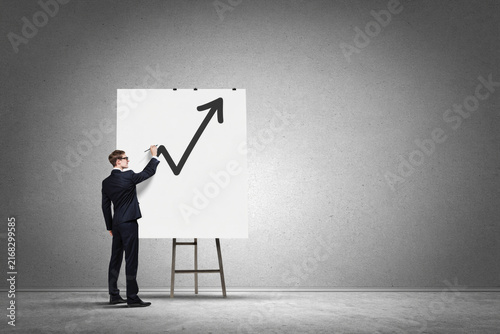 Business Professional Drawing Upward Growth Arrow on Canvas
