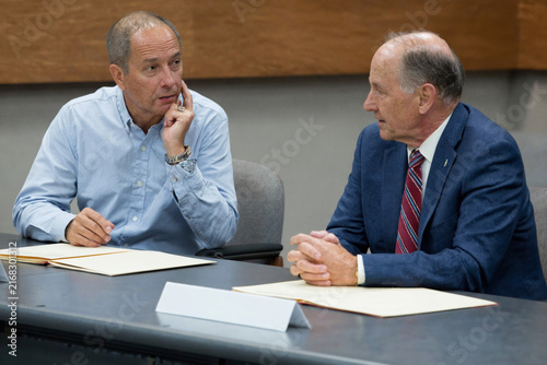 Corporate Executives Discussing Strategy in a Formal Meeting