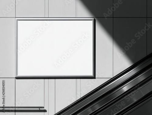 Blank billboard above escalator on tiled wall, cast shadow