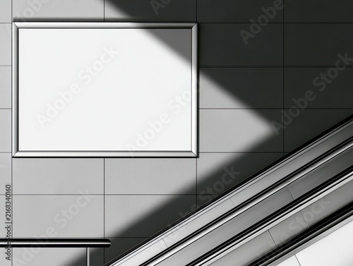 Blank sign against tiled wall, angled shadow, escalator steps
