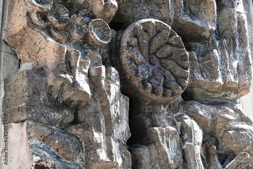 Fotografie Macro close-up of a sculptural architectural bas-relief with floral and abstract