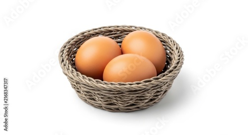 Three apples in a woven basket