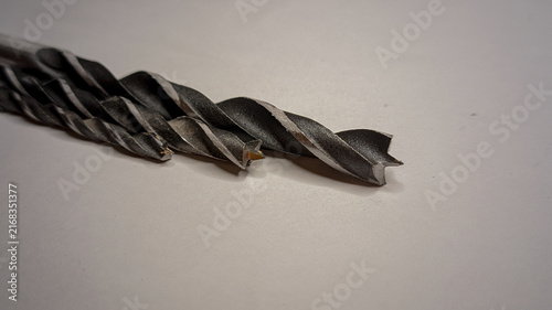Canvastavla Several wood brad point drill bits resting on a plain white surface