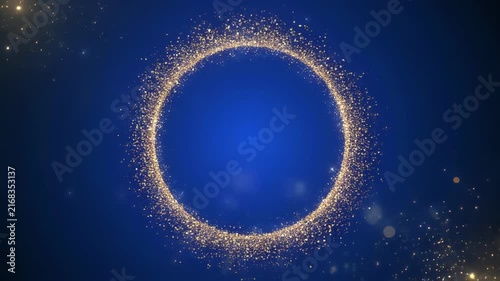 Golden Ring Expanding with Glittering Particles During Celebration on Blue Background