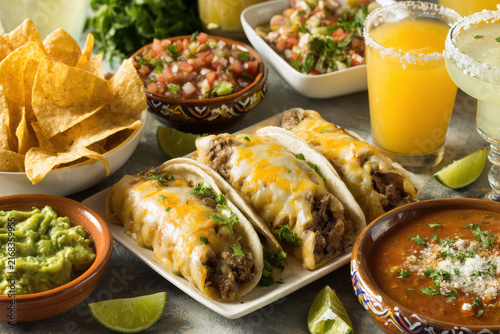 celebrate cinco de mayo with delightful display of traditional mexican dishes against clean vibrant background