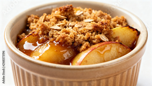 Warm baked apple crumble with cinnamon and oat topping