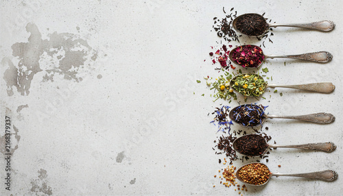 Assorted loose leaf tea blends on vintage spoons