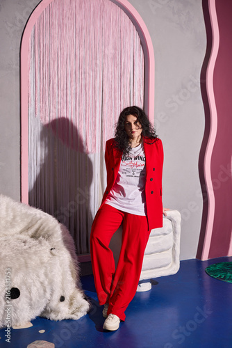 Dynamic composition showcasing fashion alongside artistic atmosphere