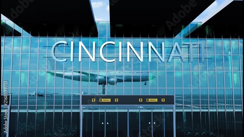 Airlane landing at Cincinnati, USA. Arrival in the city with reflection of airport and aircraft