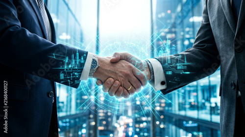 Digital business partnership and global technology innovation with businessmen shaking hands over a holographic city