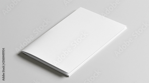 A clean 3D render mockup of a closed folded brochure or magazine with a blank white cover on a neutral grey background, ideal for corporate branding presentations.
