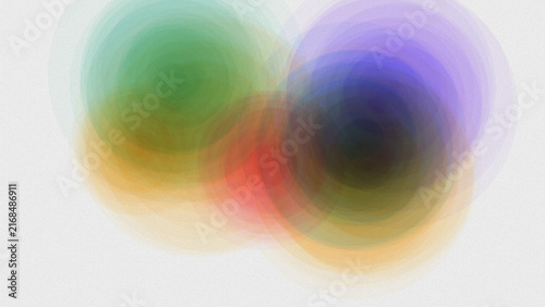 Abstract composition of overlapping translucent colorful circles creating a soft gradient effect on a light gray background surface