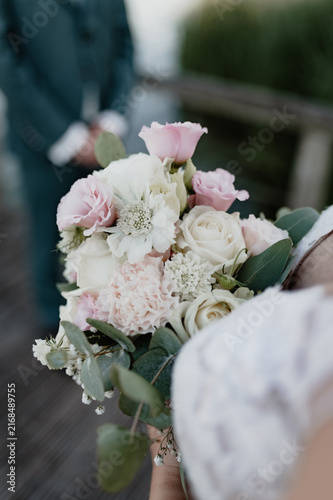 Obraz na płótnie Bridal bouquet with roses as wedding decoration