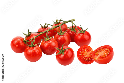 Fotografie Fresh vine cherry tomatoes with water droplets and sliced tomato halves isolated on a clean white background