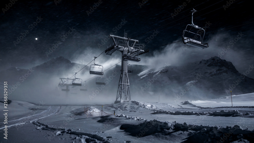Fototapeta premium Empty chairlift at a ski resort during a snowy night. Misty mountains and snow-covered slopes under a full moon. Winter sports travel concept for resort marketing and extreme weather themes.