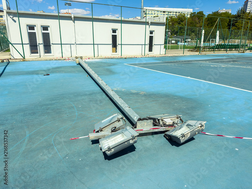 Cuadro en lienzo Construction work is ongoing on a sports court area with equipment placed near t