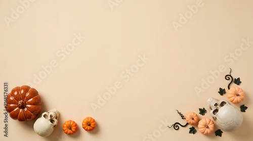 Autumnal still life with pumpkins and flowers on a neutral background