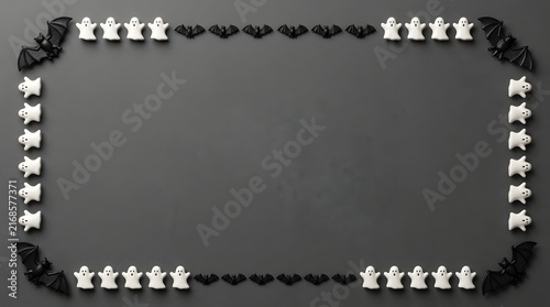 Halloween background with a decorative border of cute white ghosts and black bats on gray