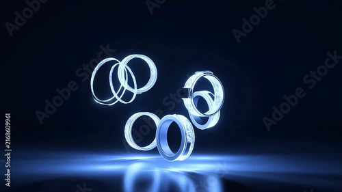 Glowing abstract rings of light on dark background.