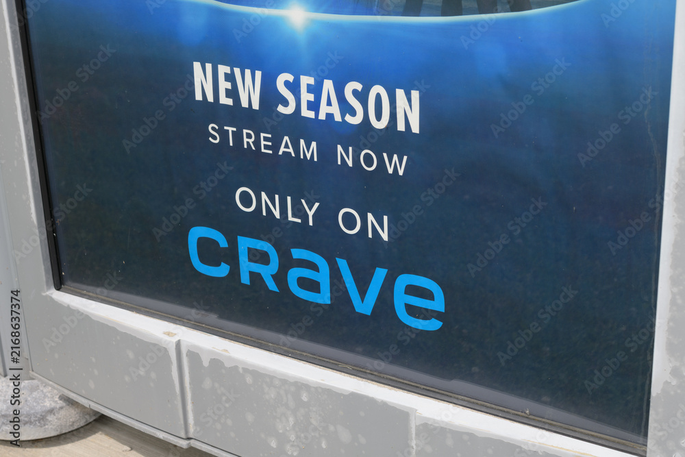 Naklejka premium Astral out-of-home transit shelter with advertising poster for Crave, a Canadian owned streaming service in Toronto