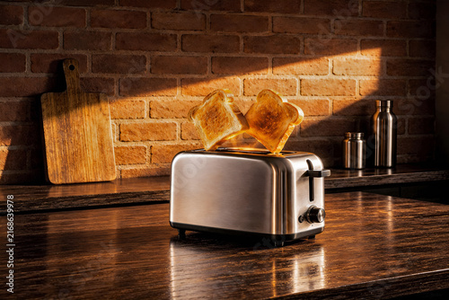 Two toasts popping from a toaster in a rustic kitchen in morning light