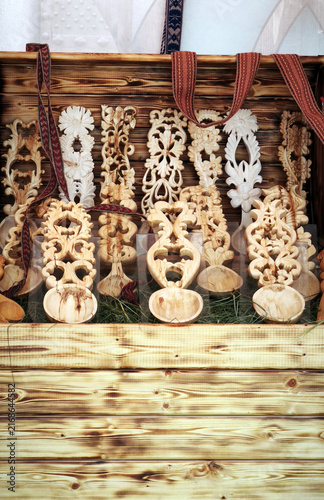 Photography Display of carved wooden spoons with ornate floral and geometric patterns
