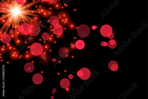 Radiant burst of red rose petals falling against a dark black background with a bright light flare