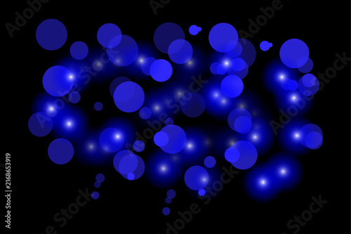 Abstract dark blue bokeh background with blurred lights creating a magical and dreamy atmospheric effect for design projects