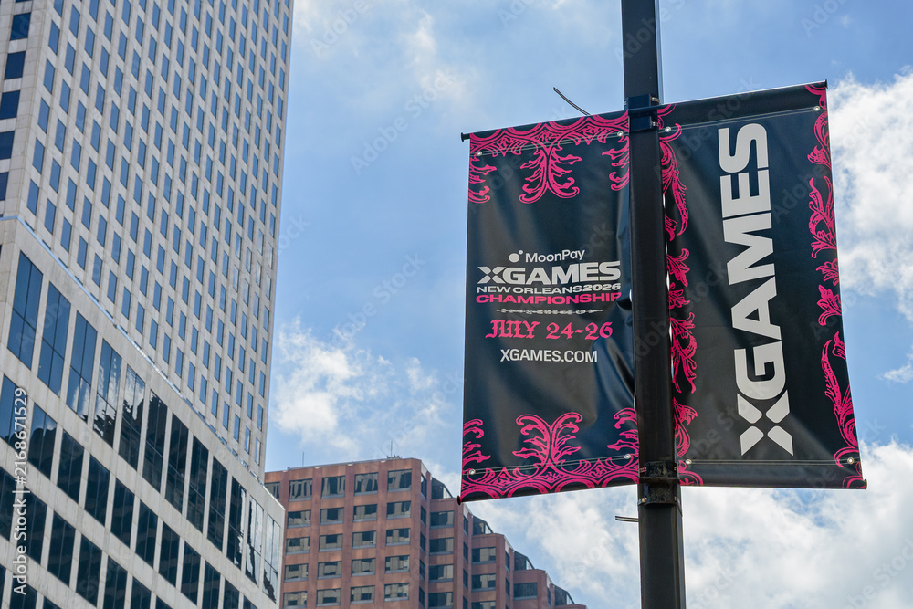 Naklejka premium New Orleans, LA, USA - July 25, 2026: Banner for 2026 XGAMES Championship in Downtown New Orleans, sponsored by MoonPay, an International Cryptocurrency Company