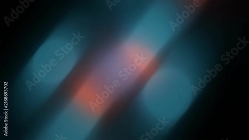 Abstract blurred background with diagonal light streaks in blue and red hues