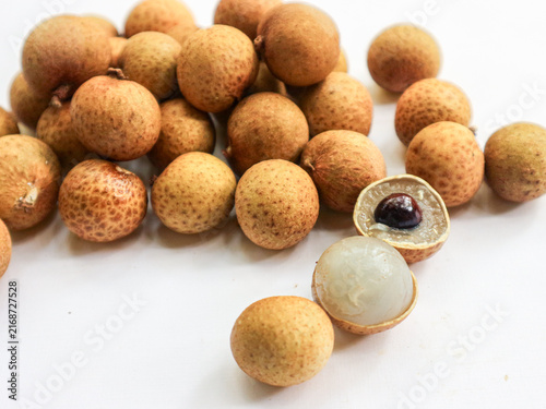 фотографія Longan, also known as kelengkeng, lengkeng, or mata kucing, is a small, sweet tropical fruit tree native to Southeast Asia that belongs to the soapberry family