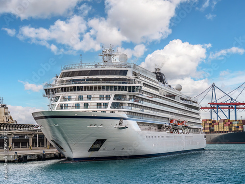Принти на полотні Luxury Cruise Ship Docked at Port under Blue Sky