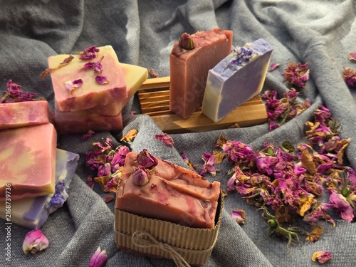 Quadro su tela Composition of colorful artisanal cold process soap bars, including a pink soap