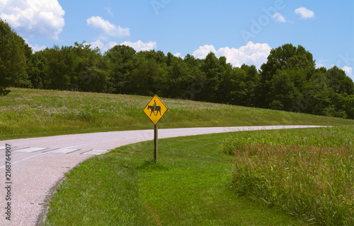 Horse Crossing Sign, Summer Landscape with Blue Sky at Wilson Creek in Battlefield, Missouri