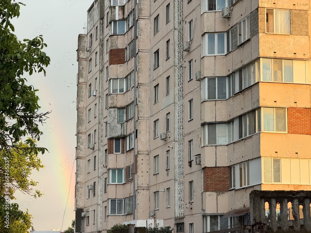 Fototapeta premium Rainbow over a Soviet-era Apartment Block in Slobozia, Transnistria, Moldova