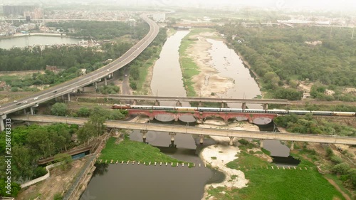 Aerial view of expressway and railway bridge over Yamuna river in New Delhi India