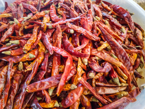 фотографія Heap of dried red chili peppers for cooking and spicy food seasoning