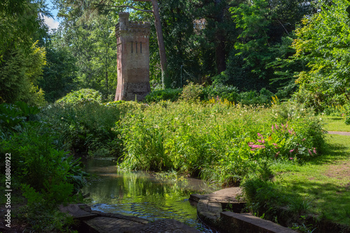 Foto Upper Gardens, Bournemouth, UK - June 30th 2026: The Bourne Stream and the Water Tower, built between 1883 and 1903 in the grade II listed gardens